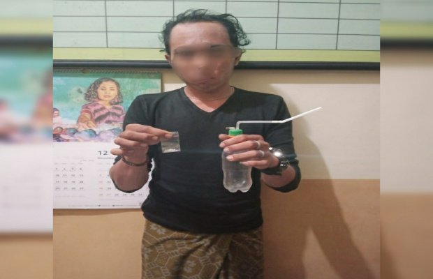 Foto: Tersangka AR usai diamankan Polisi