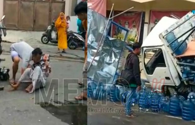 Foto : Truk dan pengendara sepeda motor saat di evakuasi oleh warga
