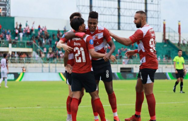 Foto: Ekspresi pemain Madura United kala tekuk PSM Makassar 2-0.