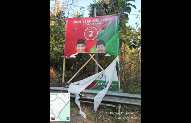 Foto: Salah satu APK pasangan Faham yang diduga dirusak OTK