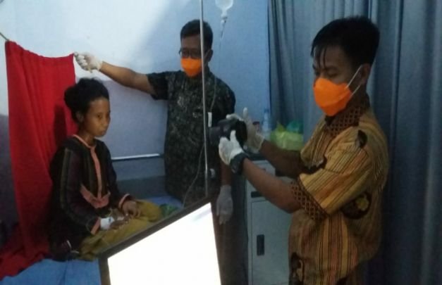Foto: Pelaksanaan Rekam Poto Kepada Warga (Pasien) di Puskesmas Tlanakan