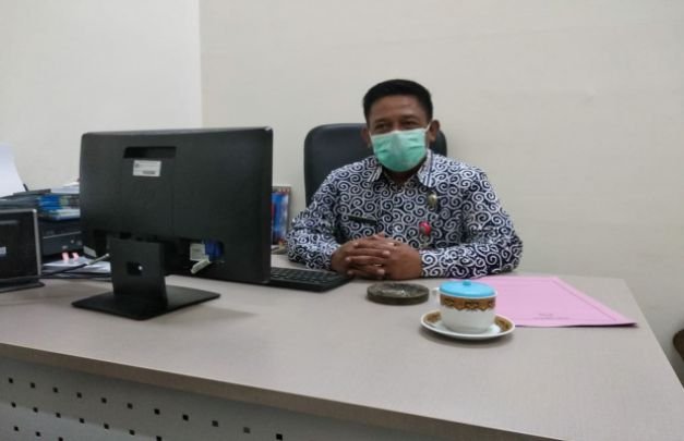 Foto: Sekretaris Dispendukcapil Pemkot Batu Kamim Utomo, S.Sos, saat ditemui di kantornya.