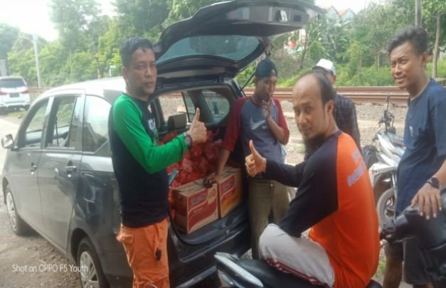 Foto : Randi, #Esa Asa Kita bersama tim peduli banjir