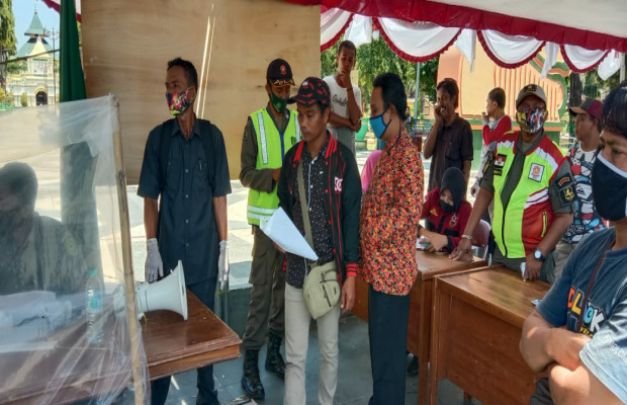 Foto: Tak berkutik, ASN yang terjaring razia masker ikut di proses 