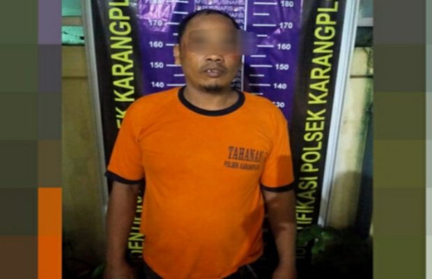 Foto: Tersangka Subakir,saat di amankan di Polsek Karangploso Kabupaten Malang