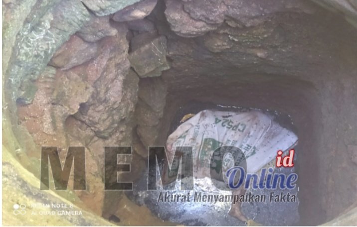 Foto : Jasad korban saat di temukan membusuk di dalam sumur tua.