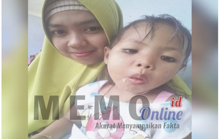 Foto: (istimewa) Toyyibah sepupu Hamidah ibu korban, bersama Alm. Selvy Nor Indahsari.