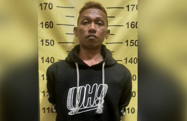 Foto:Ahmad Hidayat 33 th Preman sedang di amankan di Polsek Bululawang Kabupaten Malang