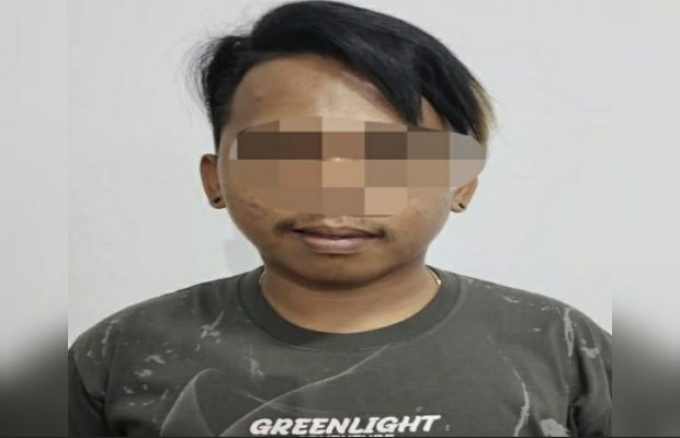 Foto: Tersangka MZA warga Desa Jatisari, Kecamatan Jenggawah.