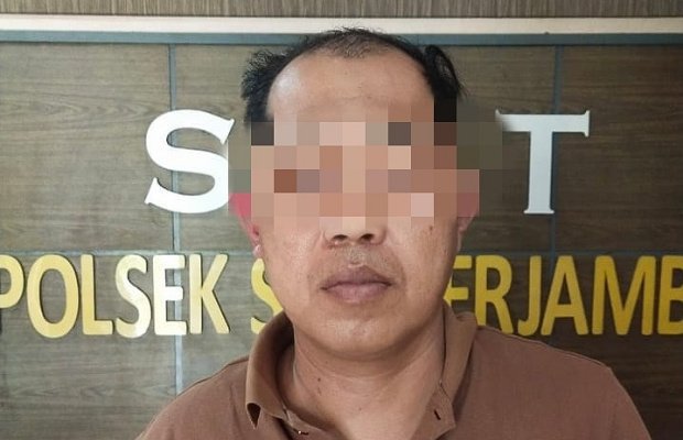 Foto: Inisial NH (44) saat di amankan polisi