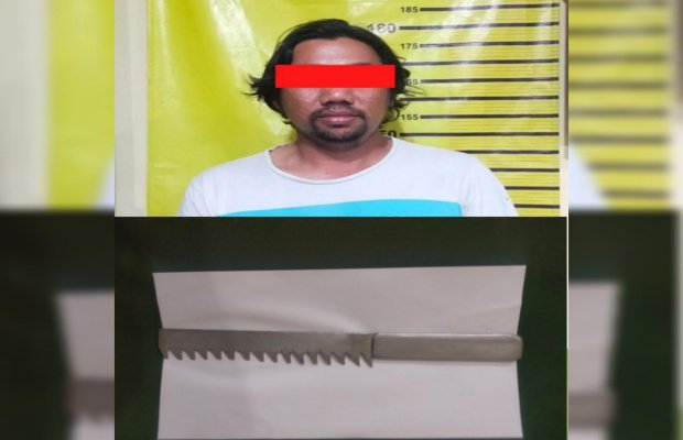 Foto: tersangka saat diamankan oleh petugas Reskrim Polsek Tambaksari Surabaya 
