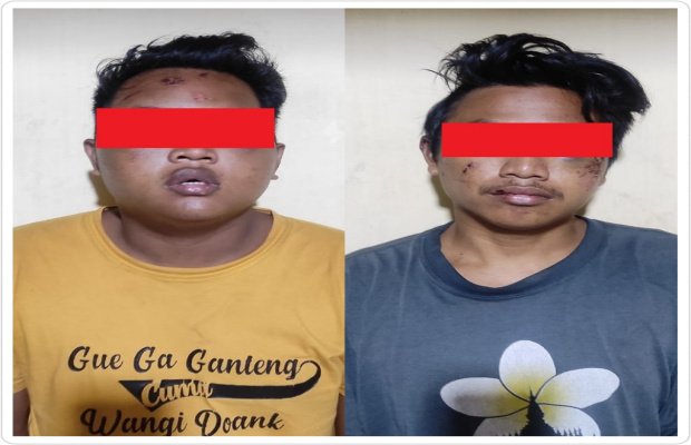 Foto : dua tersangka di polsek Tambaksari terlihat luka lebam di permukaan wajah
