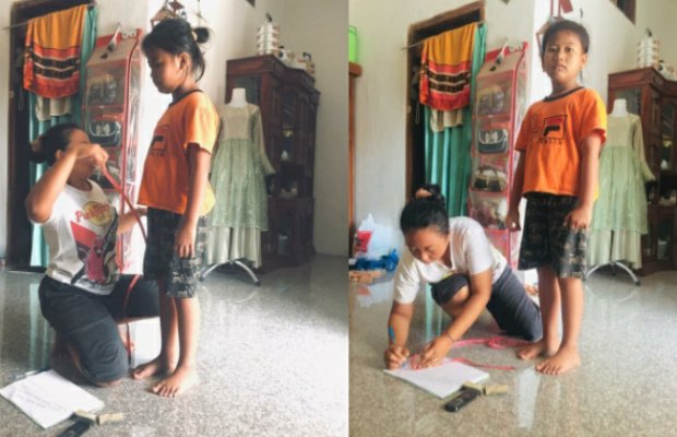 Foto: Syafika Auliyak, salah satu siswi MI An-Nur saat melakukan pengukuran baju seragam ke penjahit lokal