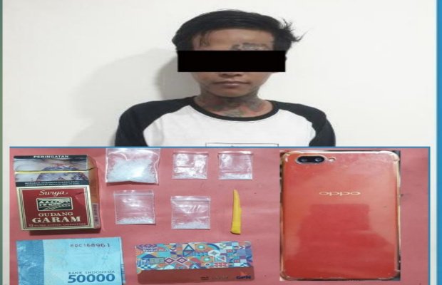 Foto : Pelaku dan barang bukti 