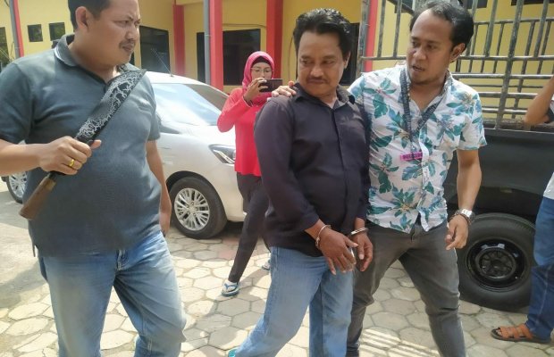 Foto : Pelaku saat digelandang petugas