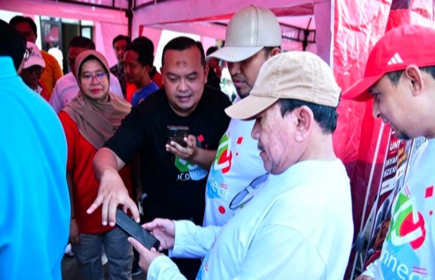 Foto: Pengenalan Transaksi Digital Lewat Program QRIS Rp1