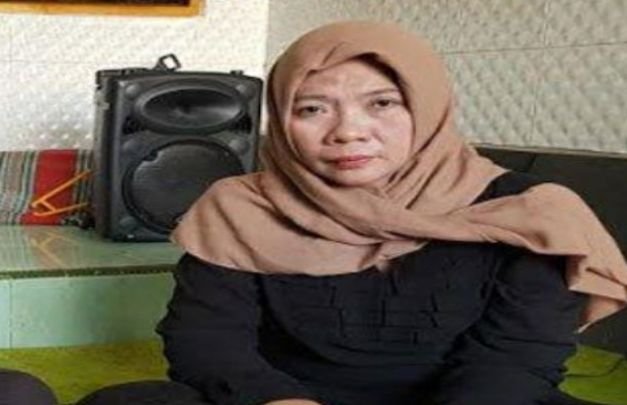 Foto: Ibu Latifa, tersangka kasus beras oplosan yg kini dilepas