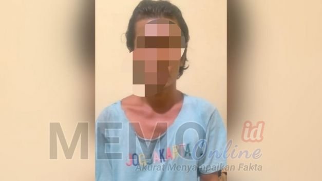 Foto : Tersangka AR saat di Mako Polres Sampang 