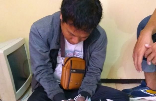 Foto: Yayan Siswanto saat diintrogasi petuga