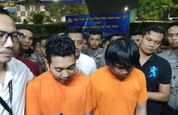 Foto: Dua pelaku ojol yang ditangkap polisi